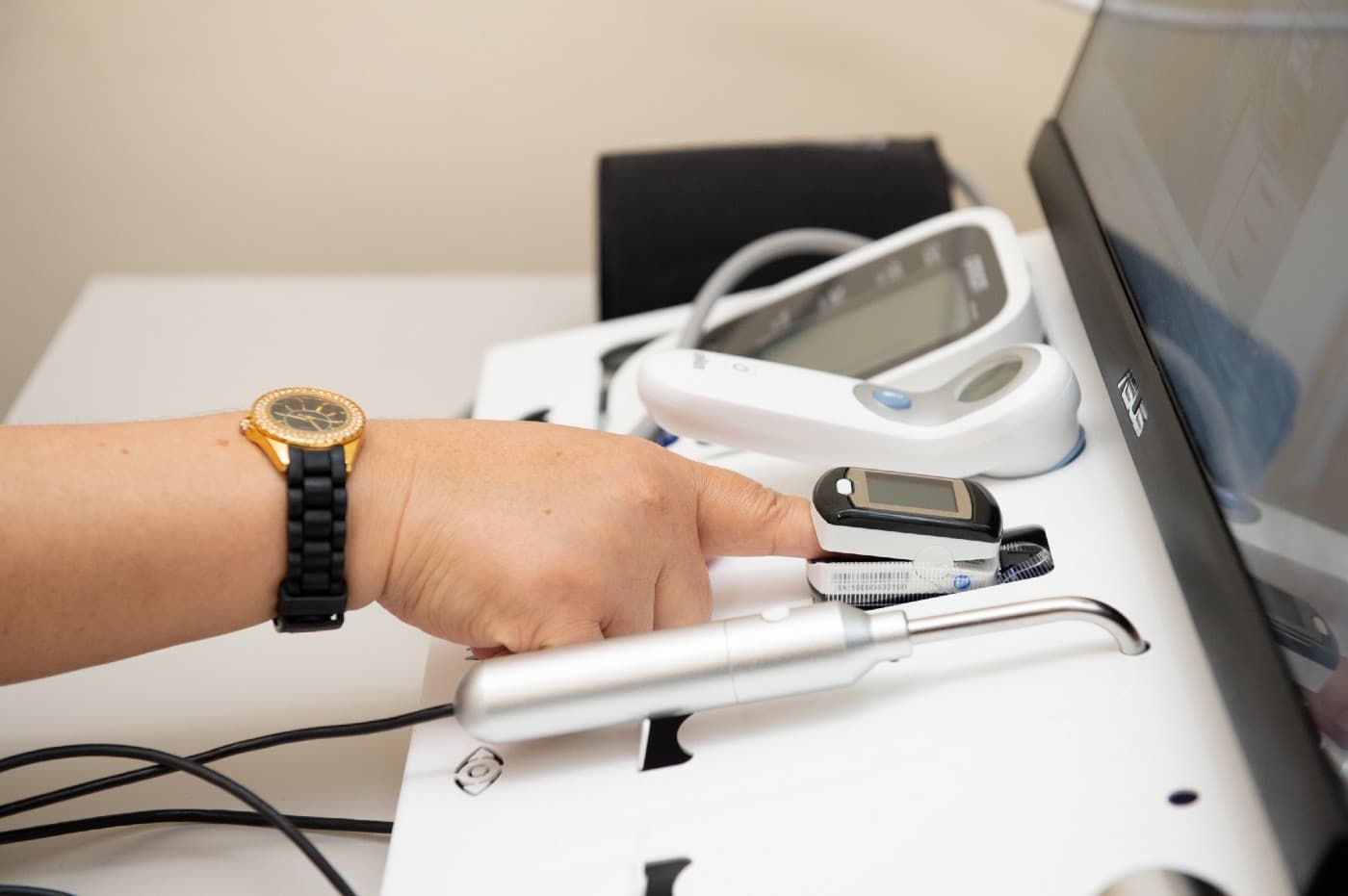 Patient using pulse oximeter during a Medicspot consultation at the Golborne Medical Centre, London, 20th April 2020 (Credit: SWNS)