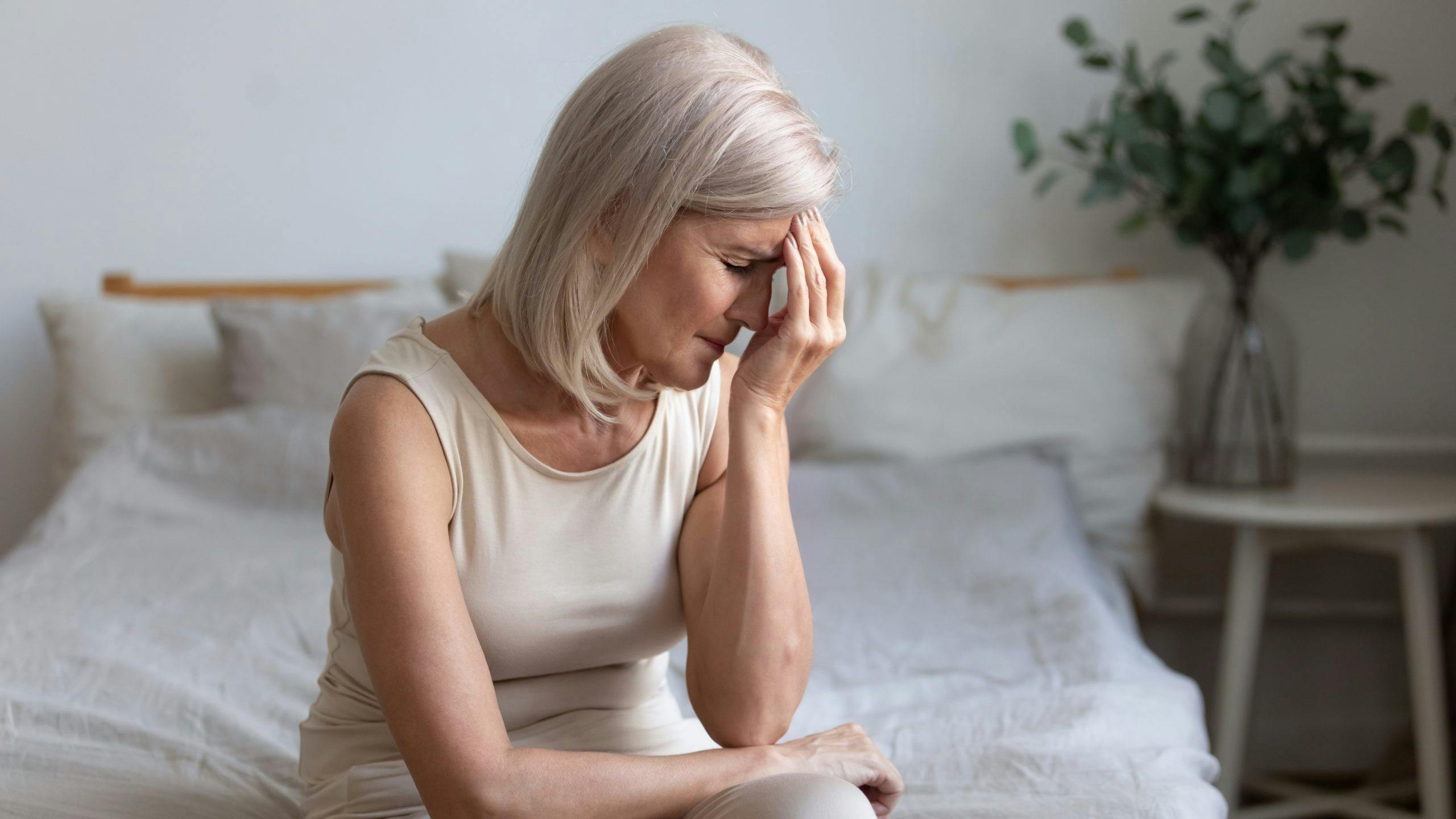 Women dealing with Menopause symptoms such as headache and fatigue